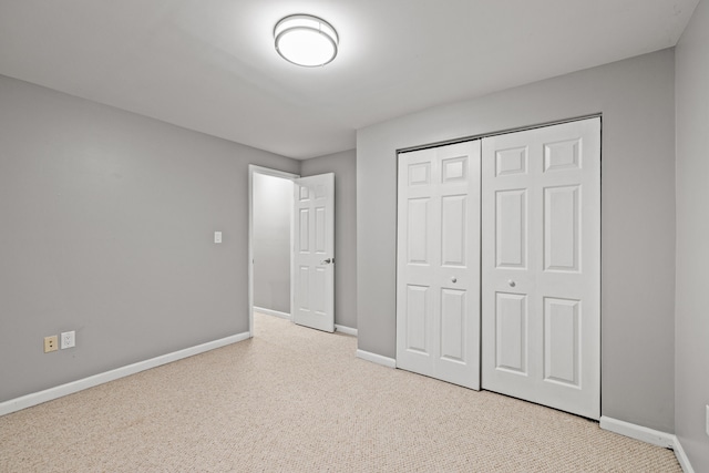 2152 Sallee Dr, Lexington, KY 40513 - unfurnished bedroom featuring baseboards, carpet floors, and a closet