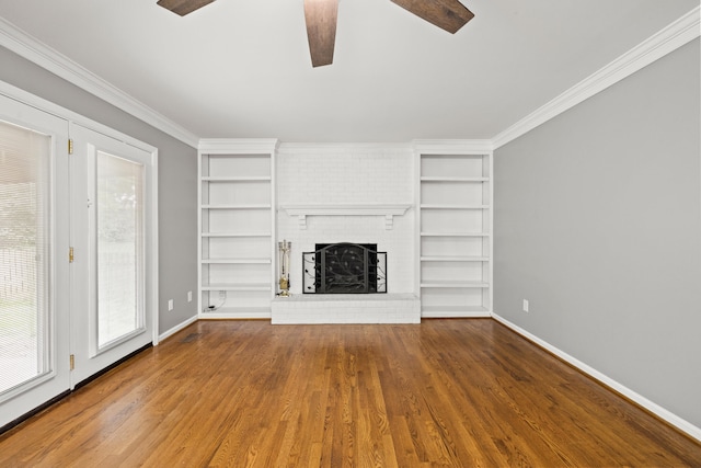 2152 Sallee Dr, Lexington, KY 40513 - unfurnished living room featuring ceiling fan, built in shelves, baseboards, wood finished floors, and crown molding