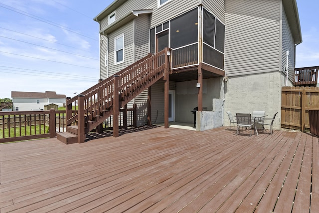 112 Covington Way, Richmond, KY 40475 - wooden deck featuring stairs, a sunroom, and outdoor dining area