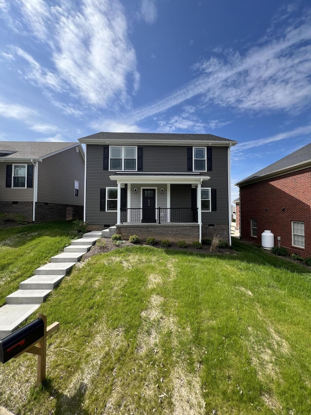 309 Gallahadion Ct, Winchester, KY 40391 - rear view of property featuring a porch and a lawn