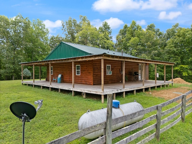 225 Grover Back Rd, Rogers, KY 41365 - view of side of home featuring a yard, log veneer siding, a deck, and metal roof