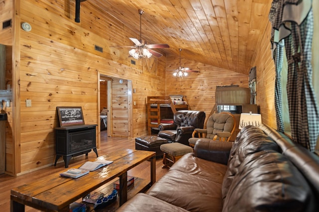 225 Grover Back Rd, Rogers, KY 41365 - living area with wood walls, wood finished floors, vaulted ceiling, a ceiling fan, and wood ceiling