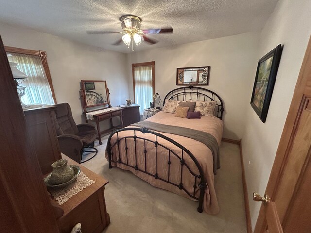 12430 E Ky-10, Quincy, KY 41166 - bedroom featuring light colored carpet, ceiling fan, and a textured ceiling