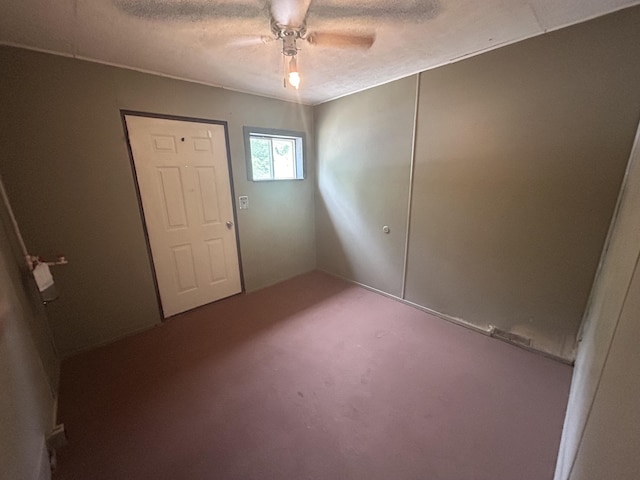 12430 E Ky-10, Quincy, KY 41166 - unfurnished room featuring carpet flooring, a ceiling fan, and a textured ceiling