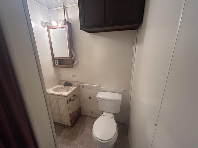 12430 E Ky-10, Quincy, KY 41166 - bathroom featuring vanity and toilet