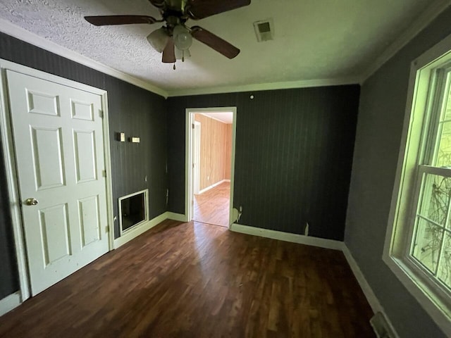 5069 Ky 11, Cannon, KY 40923 - unfurnished room featuring ornamental molding, dark wood-style floors, a ceiling fan, and baseboards