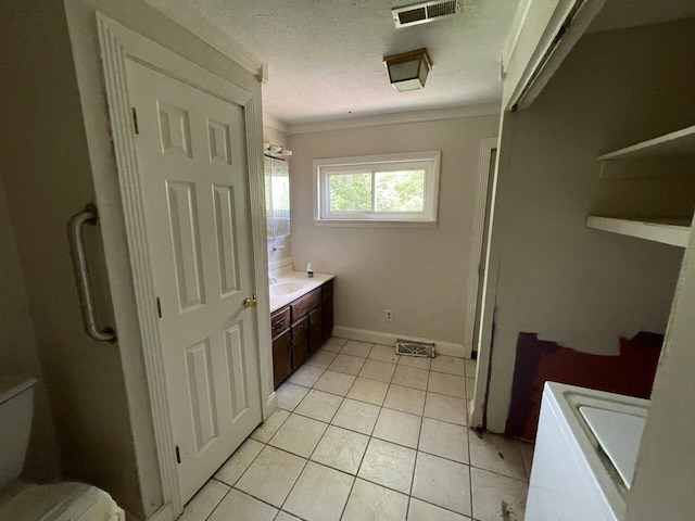 5069 Ky 11, Cannon, KY 40923 - bathroom featuring ornamental molding, vanity, toilet, tile patterned flooring, and baseboards