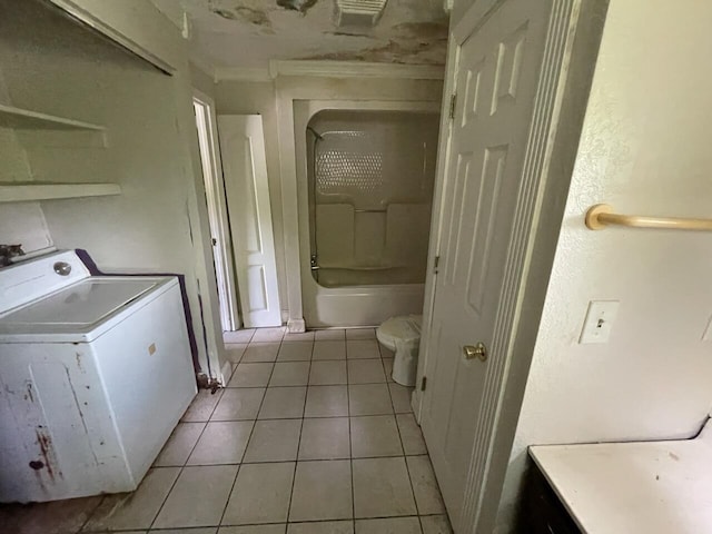 5069 Ky 11, Cannon, KY 40923 - laundry room with washer / dryer, light tile patterned floors, and ornamental molding
