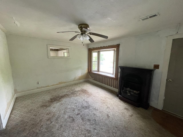 5069 Ky 11, Cannon, KY 40923 - unfurnished living room featuring carpet, a ceiling fan, baseboards, and a fireplace
