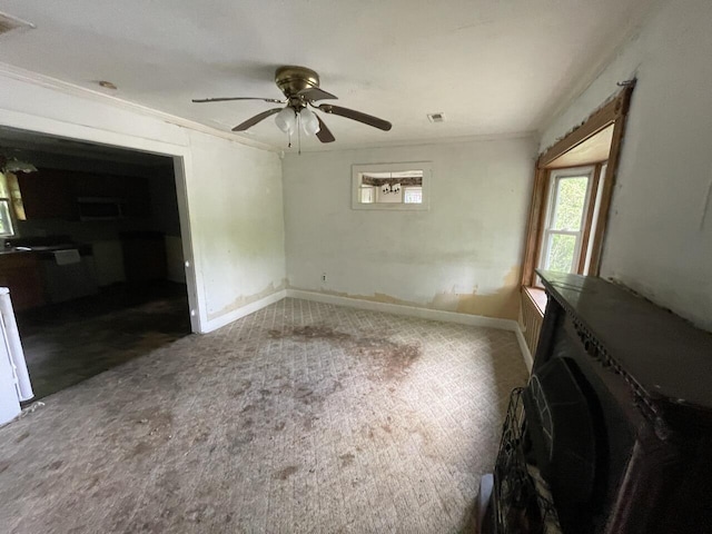 5069 Ky 11, Cannon, KY 40923 - carpeted empty room with ceiling fan, ornamental molding, and baseboards