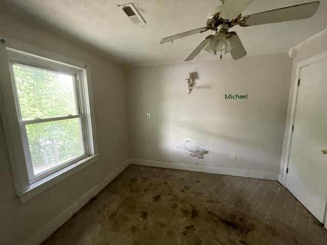 5069 Ky 11, Cannon, KY 40923 - spare room featuring baseboards and ceiling fan