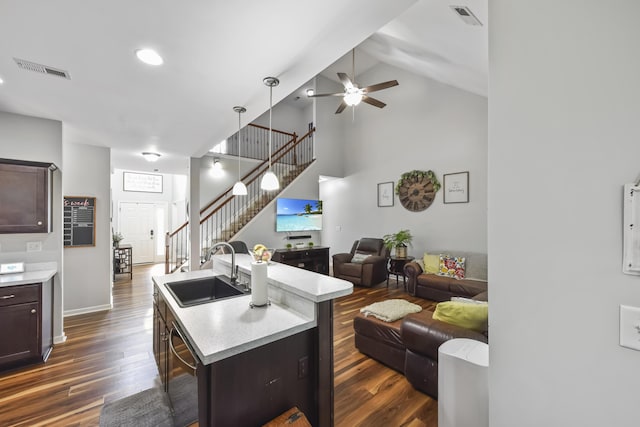 127 Schneider Blvd, Georgetown, KY 40324 - kitchen with a sink, dishwasher, open floor plan, dark wood finished floors, and high vaulted ceiling