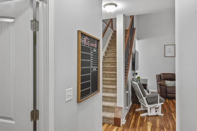 127 Schneider Blvd, Georgetown, KY 40324 - hallway featuring stairway, wood finished floors, and baseboards