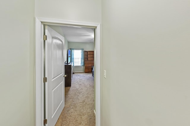 127 Schneider Blvd, Georgetown, KY 40324 - hallway featuring light carpet and baseboards