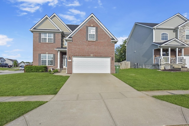 127 Schneider Blvd, Georgetown, KY 40324 - traditional-style home featuring brick siding, a garage, concrete driveway, and a front lawn