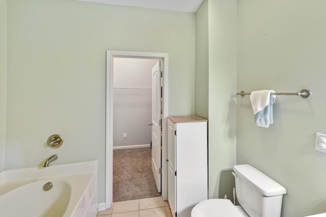 127 Schneider Blvd, Georgetown, KY 40324 - bathroom with toilet, a bath, and tile patterned floors