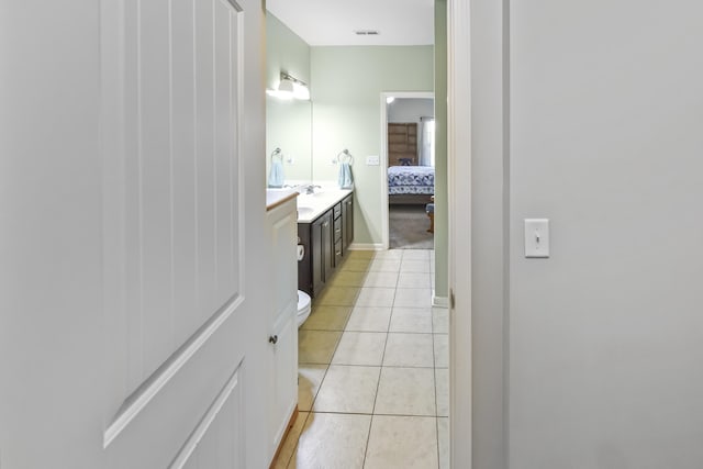 127 Schneider Blvd, Georgetown, KY 40324 - bathroom with vanity, tile patterned flooring, ensuite bath, toilet, and baseboards