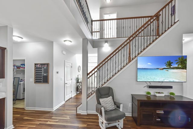 127 Schneider Blvd, Georgetown, KY 40324 - foyer featuring separate washer and dryer, stairway, wood finished floors, baseboards, and a high ceiling