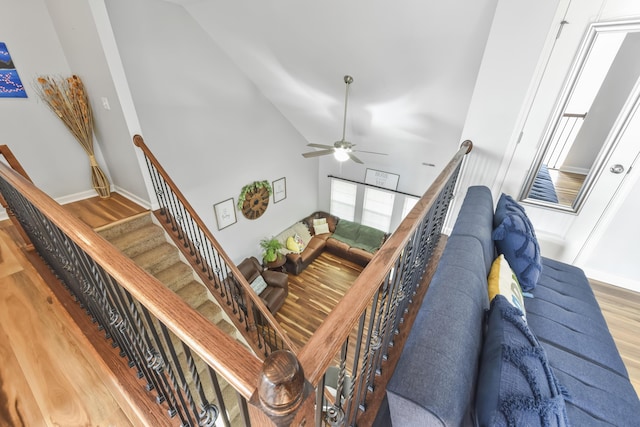 127 Schneider Blvd, Georgetown, KY 40324 - staircase with wood finished floors, ceiling fan, baseboards, and high vaulted ceiling