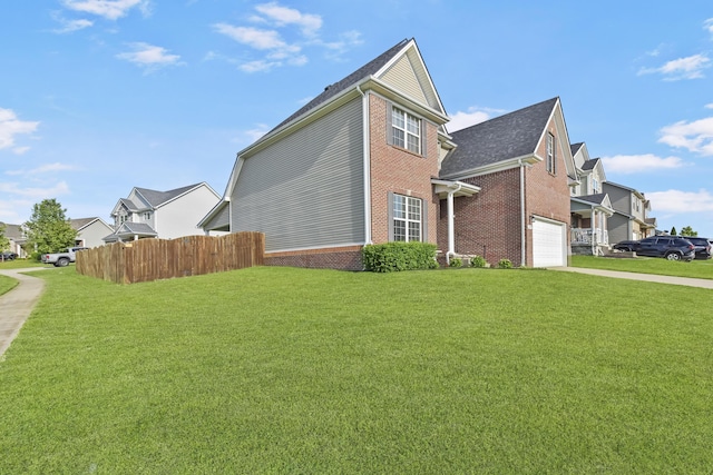 127 Schneider Blvd, Georgetown, KY 40324 - view of side of home featuring brick siding, a garage, concrete driveway, and a residential view