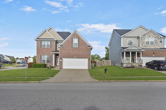 127 Schneider Blvd, Georgetown, KY 40324 - traditional home featuring an attached garage, concrete driveway, and brick siding