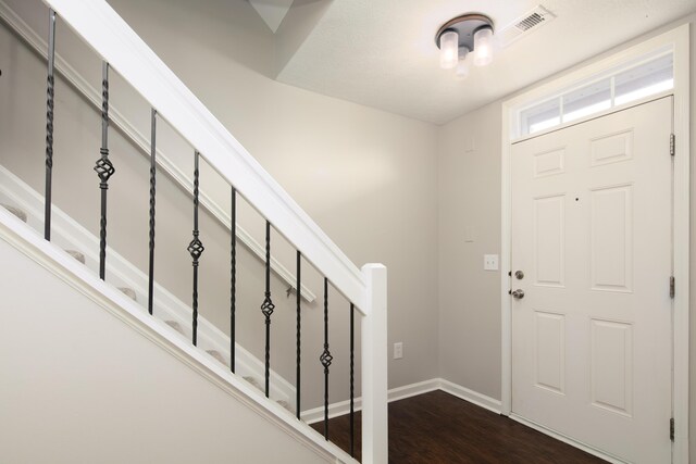 2429 Aristocracy Cir, Lexington, KY 40509 - entryway with stairway, dark wood-type flooring, and baseboards