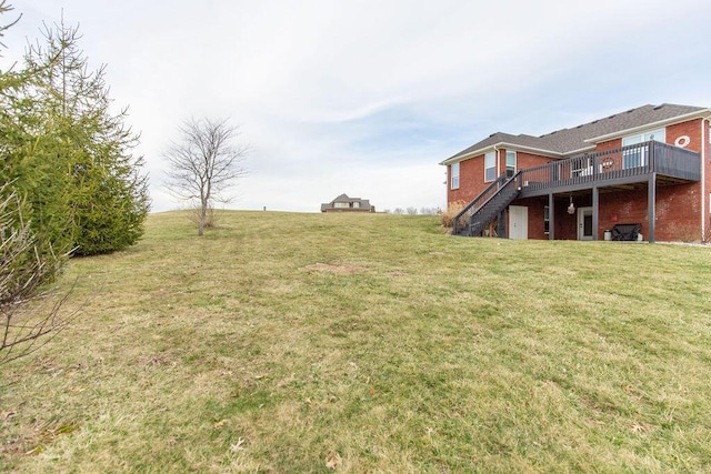 809 Muirfield Trl, Richmond, KY 40475 - view of grassy yard with a wooden deck and stairs