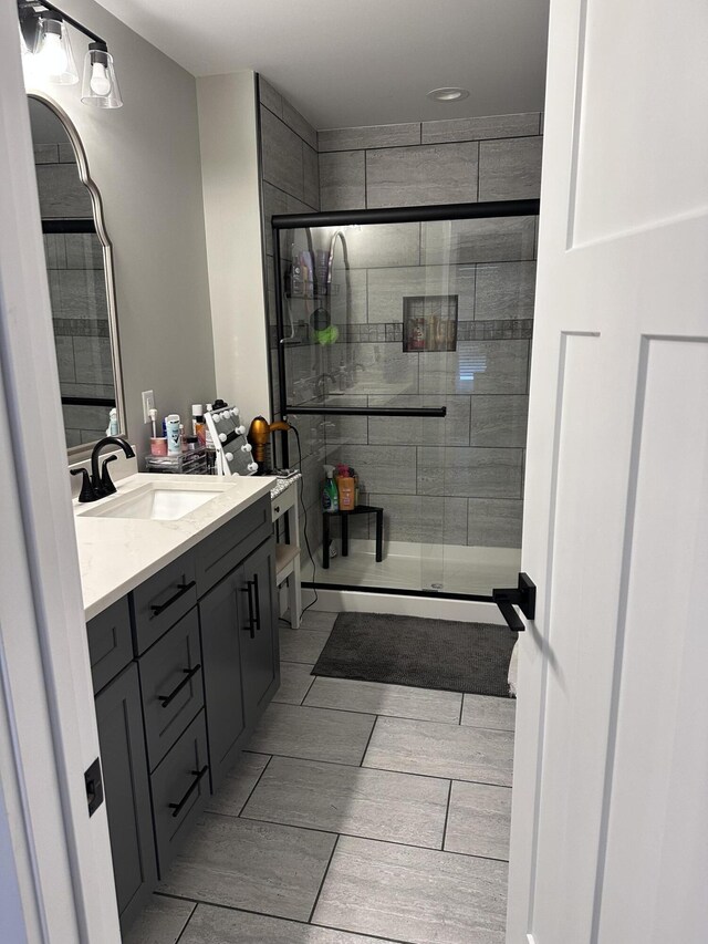 2042 Partridge Way, Richmond, KY 40475 - bathroom with vanity, a shower stall, recessed lighting, and wood finish floors
