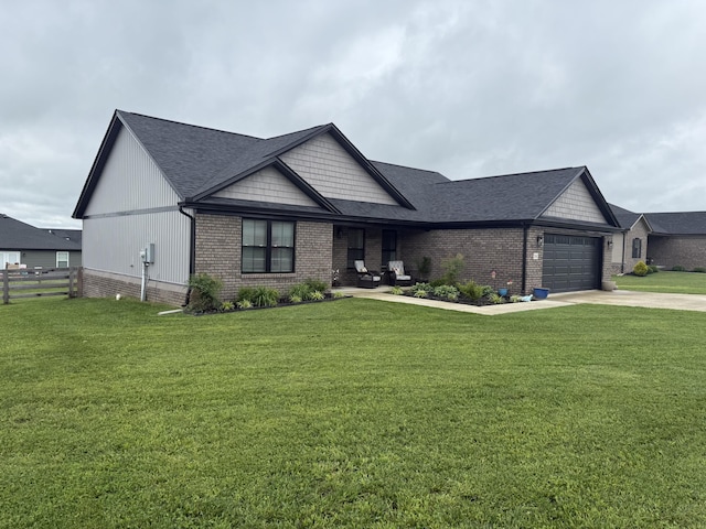 2042 Partridge Way, Richmond, KY 40475 - view of front of property featuring concrete driveway, brick siding, a garage, and roof with shingles