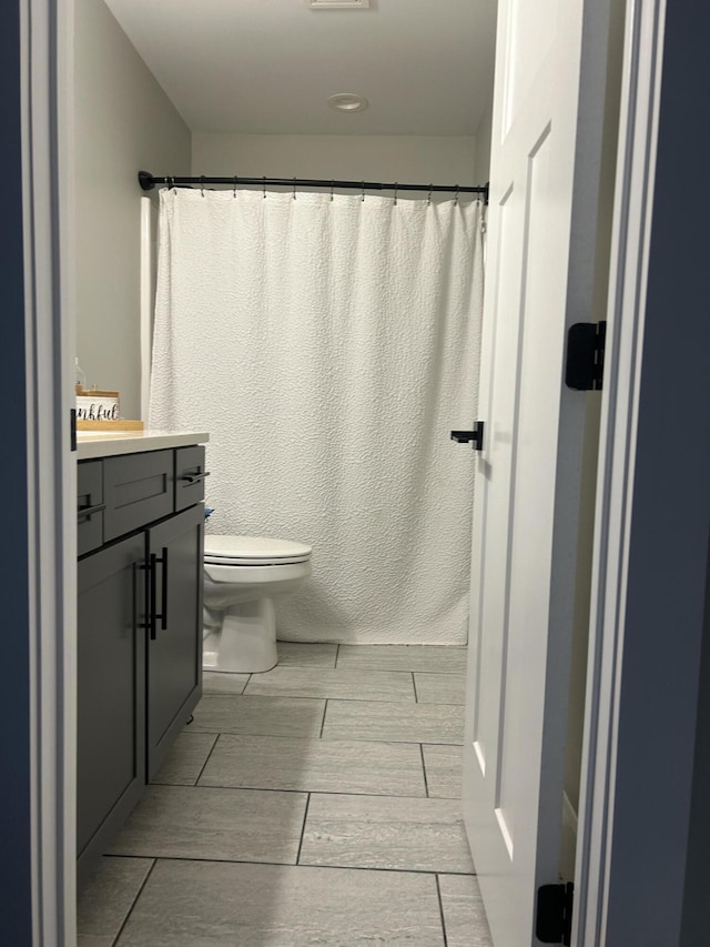 2042 Partridge Way, Richmond, KY 40475 - bathroom featuring vanity, toilet, and wood tiled floors