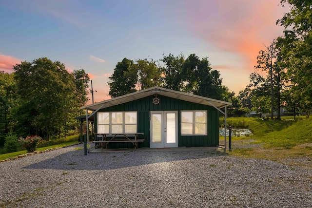 5830 Old Keno Rd, Burnside, KY 42519 - view of front of property with board and batten siding, french doors, and driveway