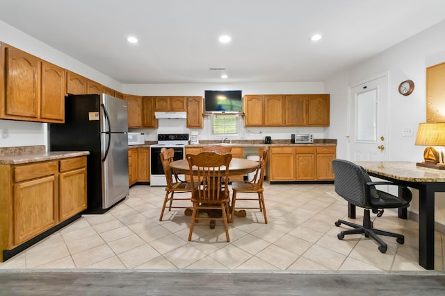 5830 Old Keno Rd, Burnside, KY 42519 - kitchen featuring white appliances, under cabinet range hood, recessed lighting, light countertops, and brown cabinets
