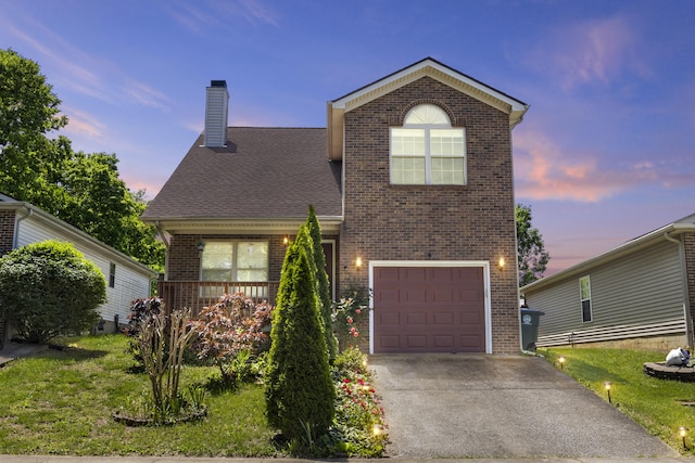 2508 Patrick Henry Way, Lexington, KY 40509 - view of front facade with brick siding, an attached garage, a chimney, driveway, and a shingled roof