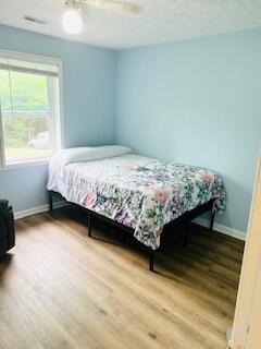 127 Circle St, London, KY 40744 - bedroom featuring wood finished floors, baseboards, and ceiling fan