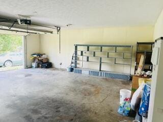 127 Circle St, London, KY 40744 - garage featuring a garage door opener