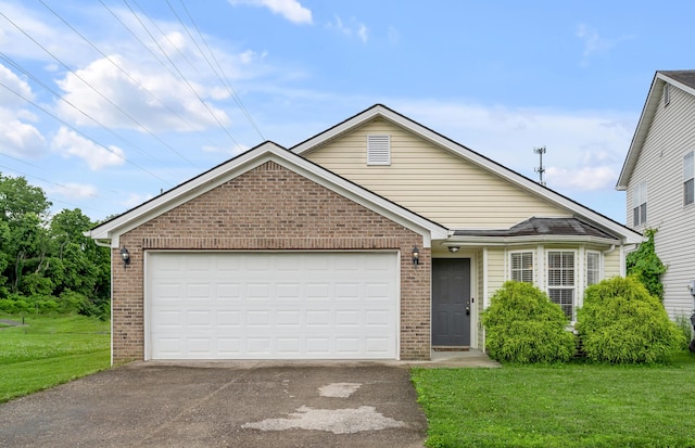 408 Joseph Bryan Way, Lexington, KY 40514 - ranch-style house featuring brick siding, driveway, a front yard, and a garage