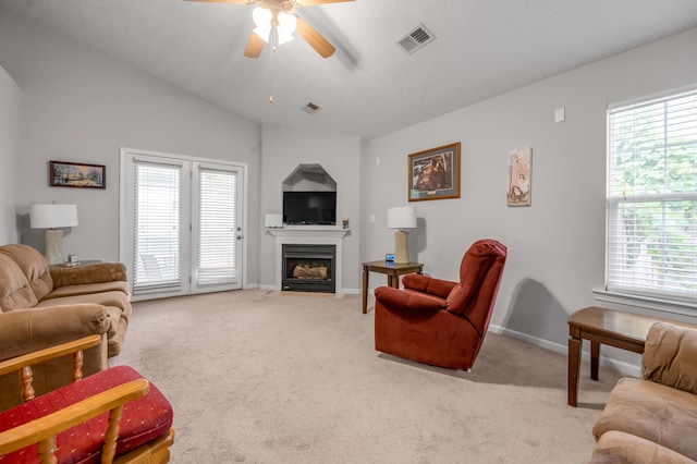 408 Joseph Bryan Way, Lexington, KY 40514 - living area with ceiling fan, carpet floors, a fireplace with flush hearth, plenty of natural light, and lofted ceiling
