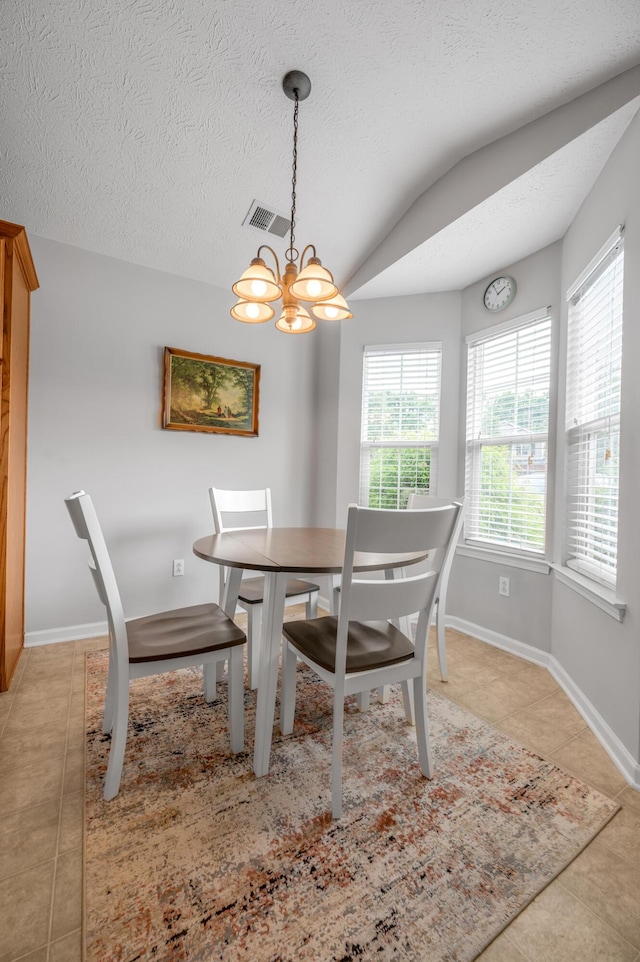408 Joseph Bryan Way, Lexington, KY 40514 - dining room featuring light tile patterned floors, a chandelier, baseboards, vaulted ceiling, and a textured ceiling