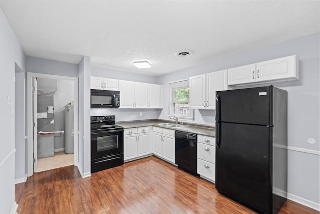1609 Magna Oak Dr, Lexington, KY 40515 - kitchen with black appliances, a sink, white cabinetry, dark wood-style floors, and baseboards
