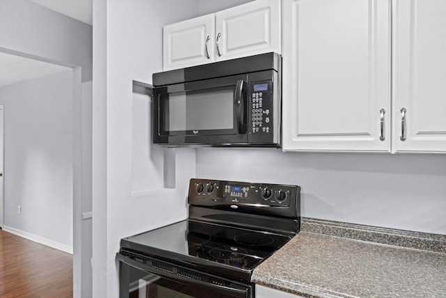1609 Magna Oak Dr, Lexington, KY 40515 - kitchen featuring black appliances, white cabinets, wood finished floors, and baseboards