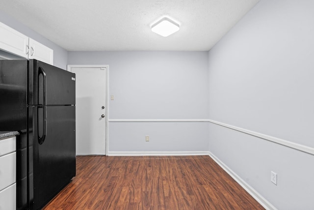 1609 Magna Oak Dr, Lexington, KY 40515 - kitchen featuring freestanding refrigerator, dark wood-style floors, white cabinetry, baseboards, and a textured ceiling
