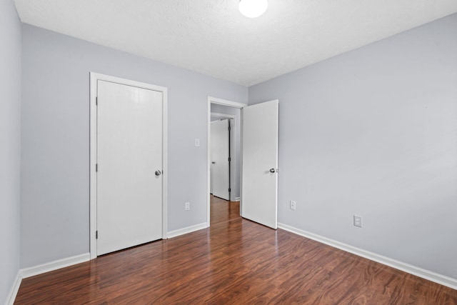 1609 Magna Oak Dr, Lexington, KY 40515 - unfurnished bedroom featuring wood finished floors and baseboards