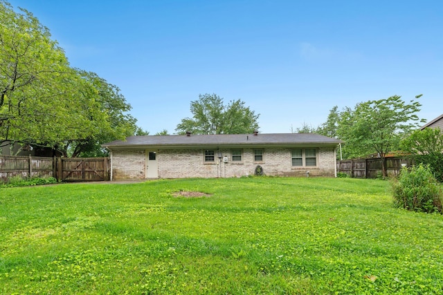 1609 Magna Oak Dr, Lexington, KY 40515 - back of house featuring brick siding and a gate