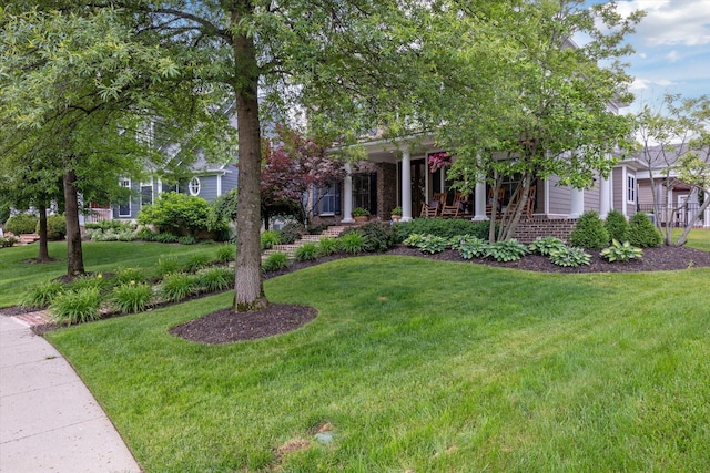 1821 Goodpaster Way, Lexington, KY 40505 - obstructed view of property with a front lawn, brick siding, and a porch