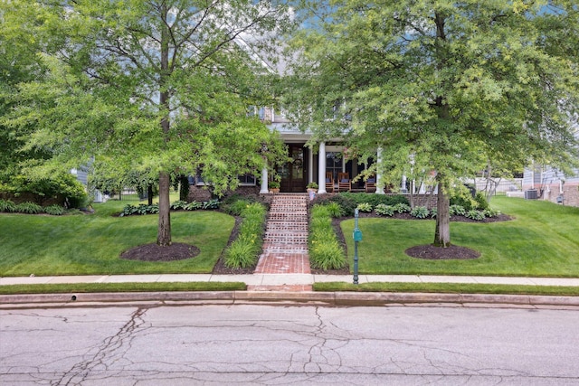 1821 Goodpaster Way, Lexington, KY 40505 - view of property hidden behind natural elements featuring a front yard, stairway, and a porch