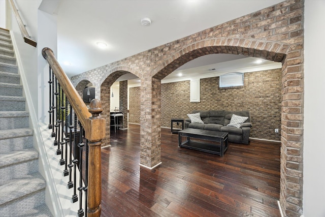 1821 Goodpaster Way, Lexington, KY 40505 - living area with arched walkways, hardwood / wood-style floors, and stairs
