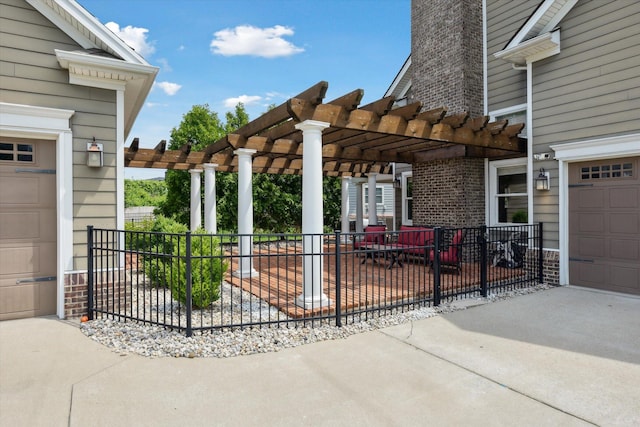 1821 Goodpaster Way, Lexington, KY 40505 - view of patio with a pergola, a garage, and concrete driveway