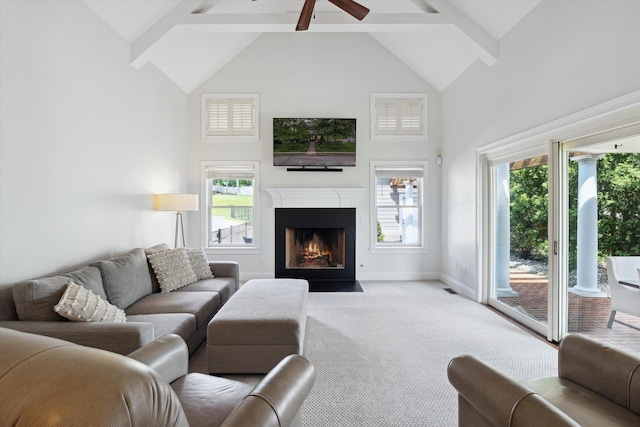 1821 Goodpaster Way, Lexington, KY 40505 - living room featuring high vaulted ceiling, carpet floors, beamed ceiling, a high end fireplace, and healthy amount of natural light