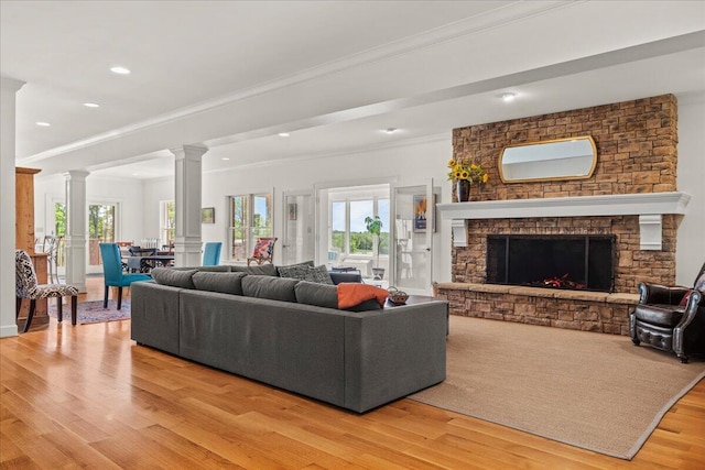 553 White Oak Rd, Stamping Ground, KY 40379 - living room with decorative columns, light wood finished floors, ornamental molding, recessed lighting, and a fireplace