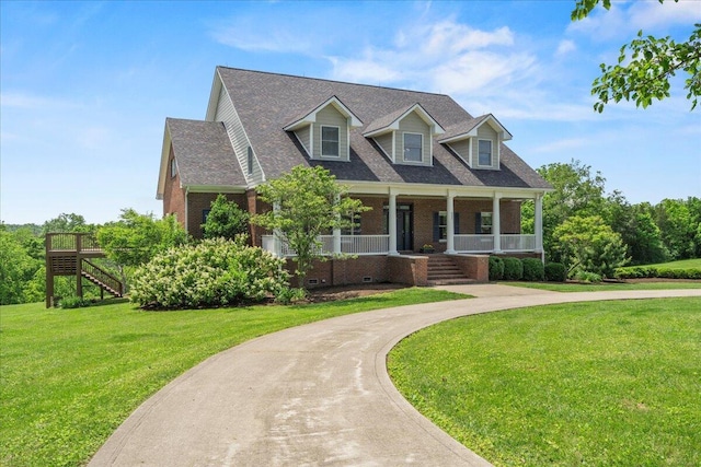 553 White Oak Rd, Stamping Ground, KY 40379 - cape cod home featuring stairway, a porch, brick siding, and a front yard